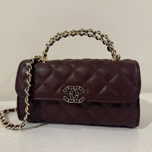 Chanel makeup bag deep burgundy with gold hardware